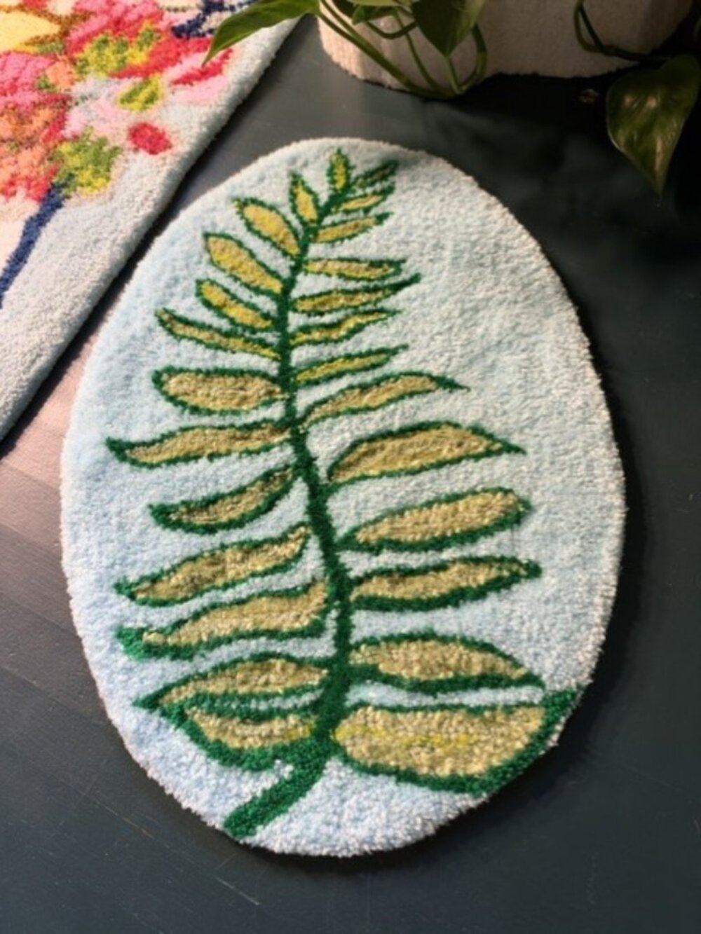 Handmade blue and green Ivy carpet